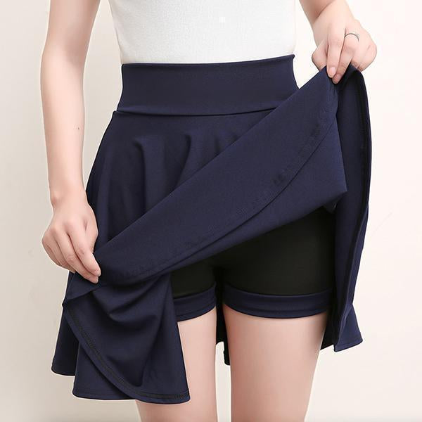 Navy A-line skirt with attached shorts and elastic waistband