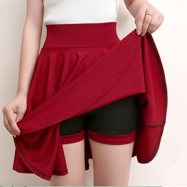 Burgundy A-line skirt with attached shorts and elastic waistband