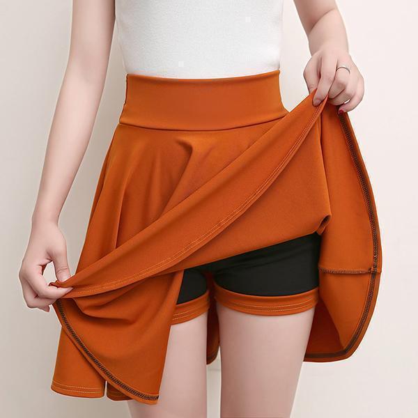 Orange A-line skirt with attached shorts and elastic waistband