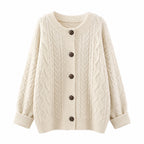 Beige cable knit cardigan with crew neckline, button front, and ribbed cuffs