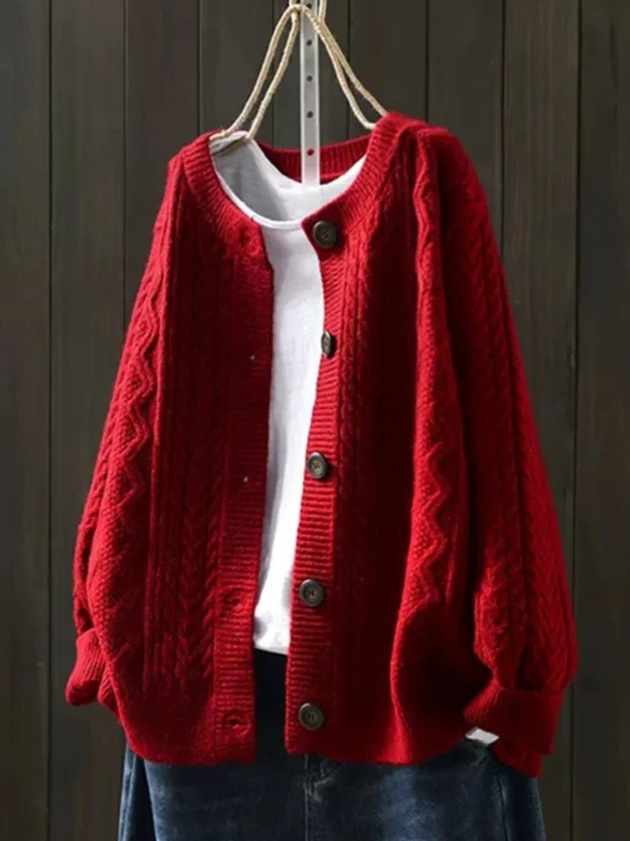 Red oversized cable knit cardigan with button front and ribbed cuffs