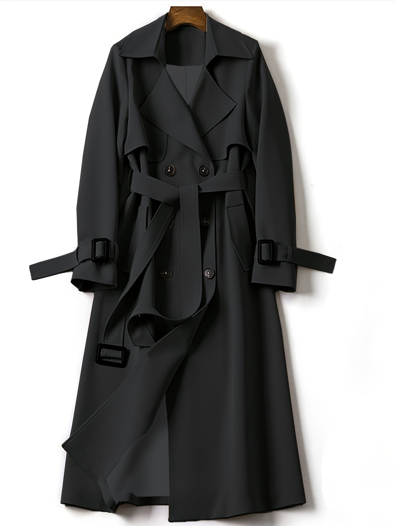 Black longline double-breasted trench coat with wide lapels, belt and buttoned front