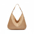 Tan hobo bag with two top handles and suede-textured finish