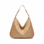 Tan hobo bag with two top handles and suede-textured finish