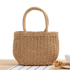 Woven summer tote bag in khaki with round top handles and textured woven weave