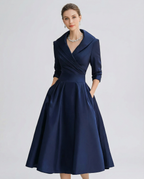 Women's A-line summer dress with lapel wrap bodice, cinched waist, 3/4 sleeves, navy