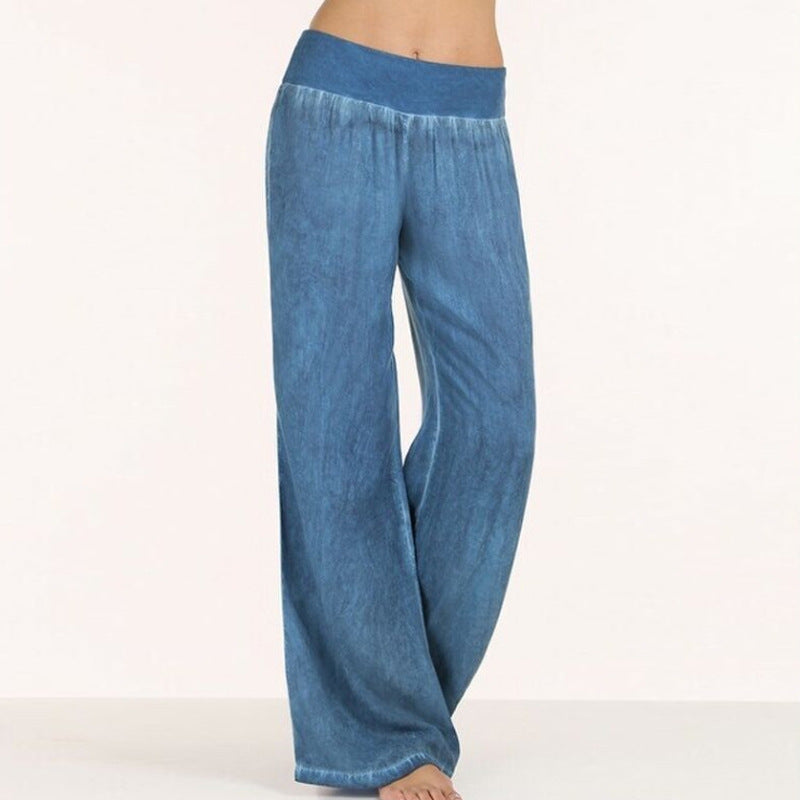 Dark blue relaxed wide-leg trousers with elastic waistband and flowing straight wide legs