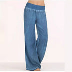 Dark blue relaxed wide-leg trousers drape loosely from elastic waistband to wide hem