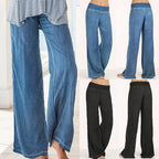 Dark blue relaxed wide-leg trousers, long loose fit with elastic waistband and open hem