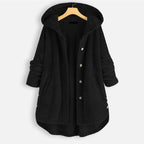 Black hooded winter coat with textured fabric, button front, long sleeves.