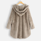 Light beige hooded winter coat with textured fabric, button front, long sleeves.