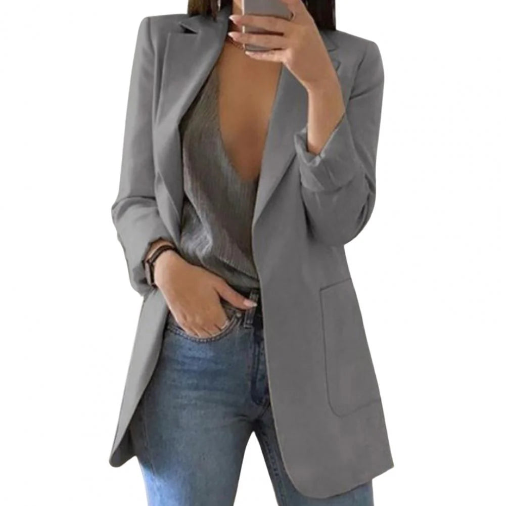 Gray long women's blazer with notched lapels and tailored fit, structured front pockets