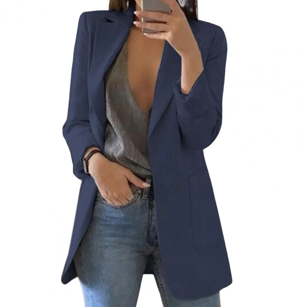 Navy blue long women's blazer with notched lapels and tailored fit, structured front pockets