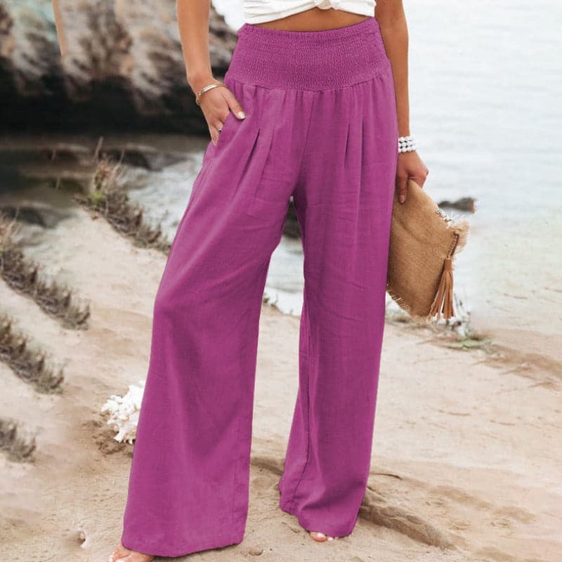 Women’s smocked drape wide-leg pants in magenta-purple, elastic waistband