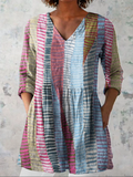 Multicolour striped long V-neck blouse with gathered peplum hem and long sleeves