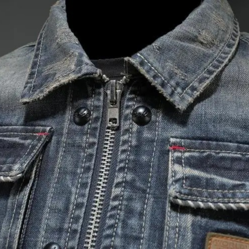Andreas™ classic denim jacket close-up: metal zipper, snap buttons, chest pocket and collar
