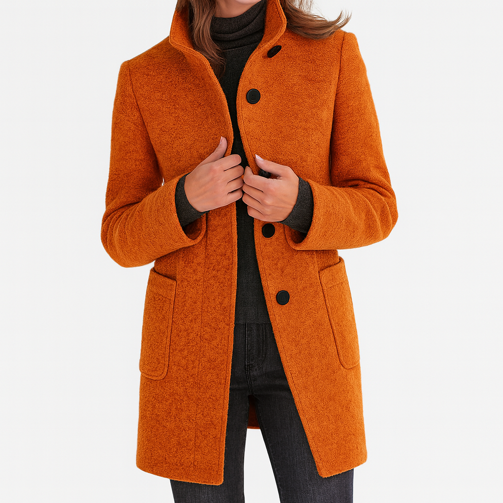 Orange winter coat with high collar, button front, and flap pockets on the sides