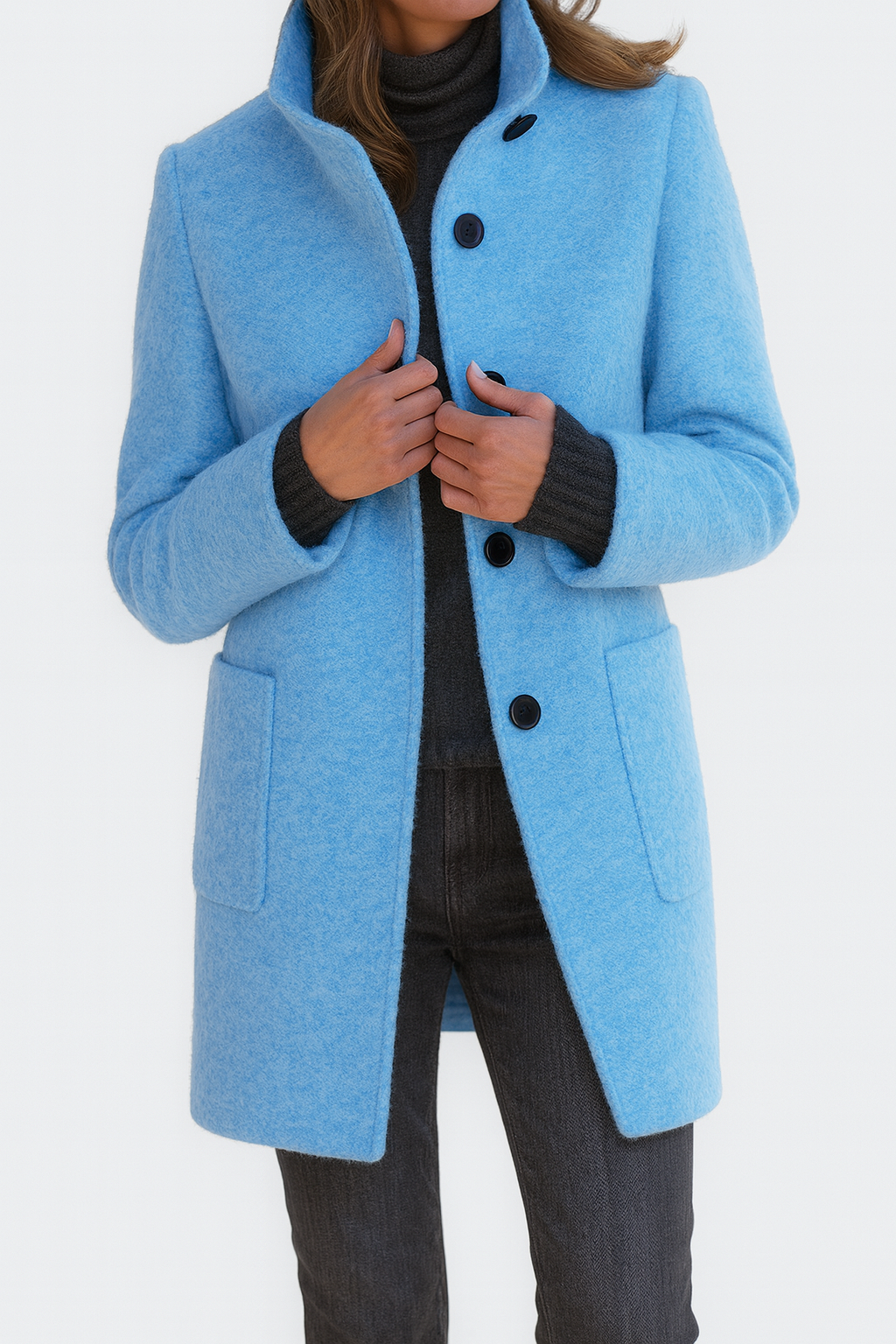 Light blue winter coat with high collar, button front, and flap pockets on the sides
