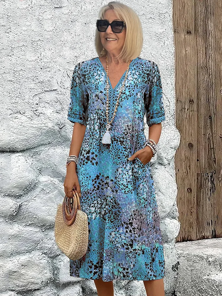 Women's floral V-neck midi dress in blue, short sleeves, tassel tie at V-neck