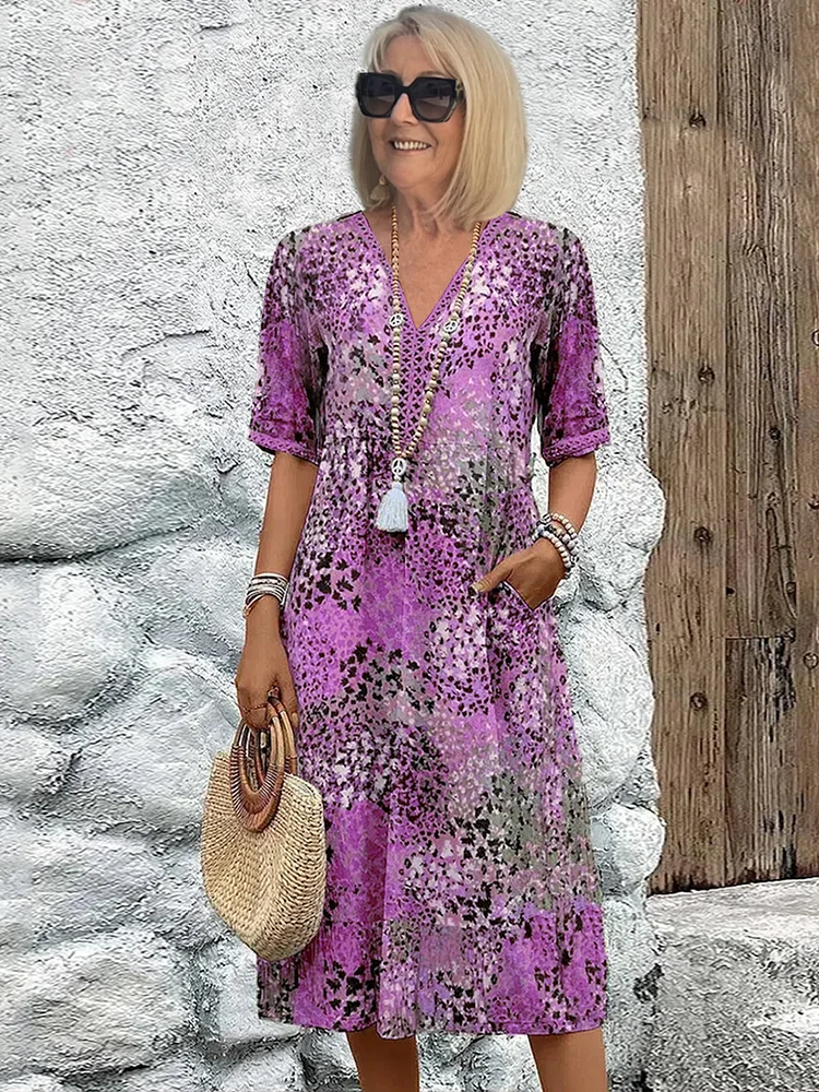 Women's floral V-neck midi dress in purple, short sleeves, tassel tie at V-neck