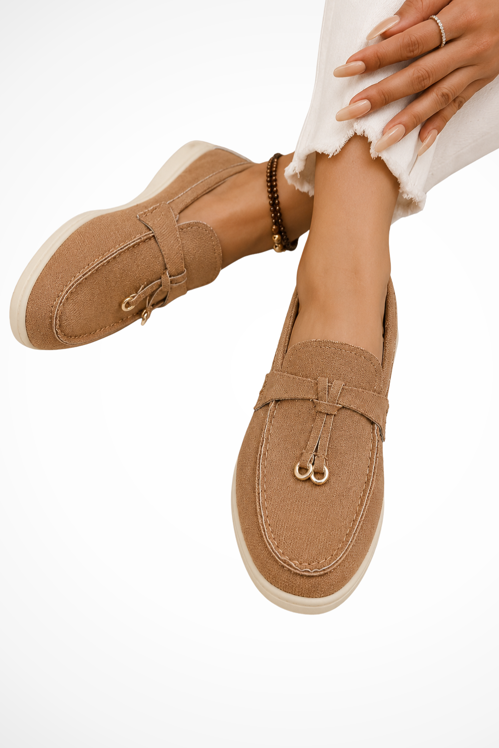Brown suede slip-on loafers with front strap and gold bit detail