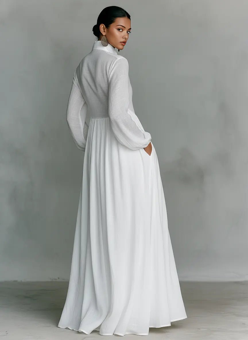 Light blue women's maxi dress with stand collar, button front and flared skirt