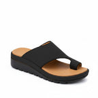 Women's black backless platform slide sandals with asymmetrical cutout straps