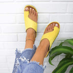 Women's yellow backless platform slide sandals with asymmetrical cutout straps