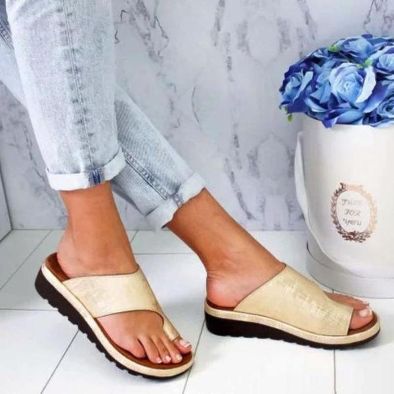 Beige backless platform slide sandals with wide upper strap and ridged outsole