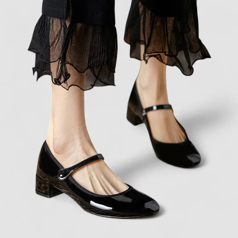 Black Mary Jane flats with ankle strap and square toe heel