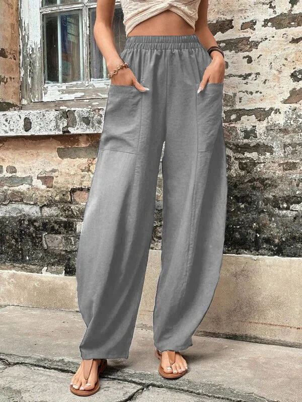 Relaxed wide-leg palazzo trousers in gray with elastic waist and loose, flowy legs