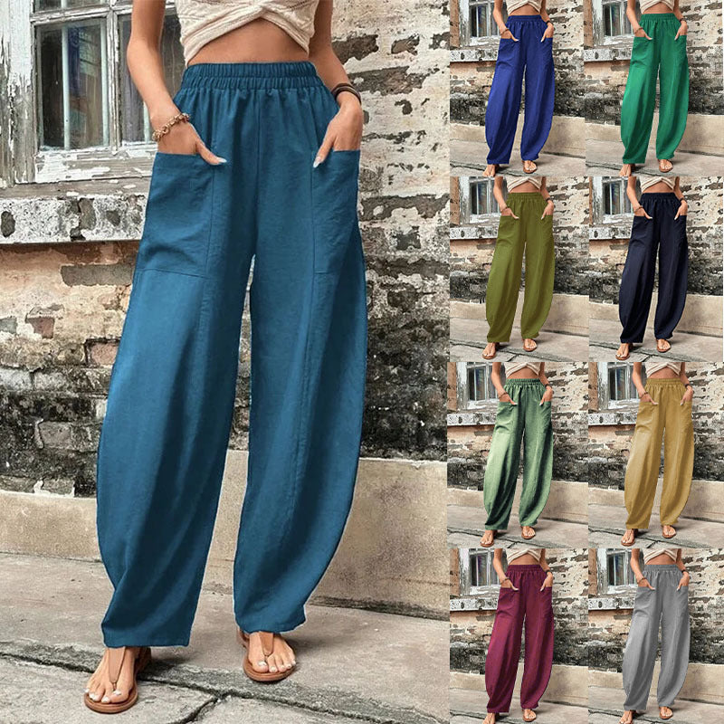 Relaxed wide-leg palazzo trousers in teal-blue with elastic waistband and wide legs