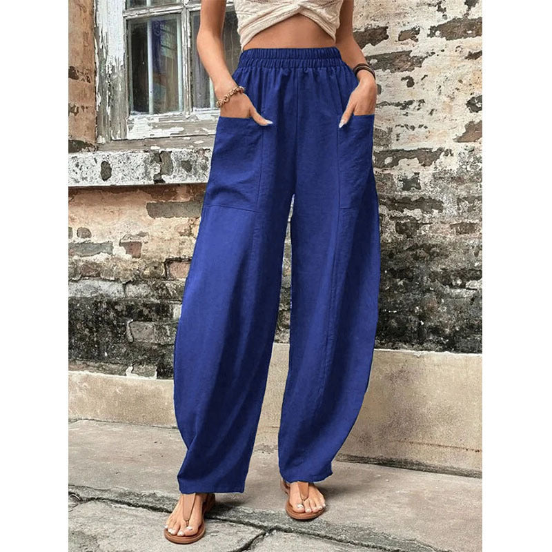 Relaxed wide-leg palazzo trousers in dark blue with elastic waist and billowy silhouette