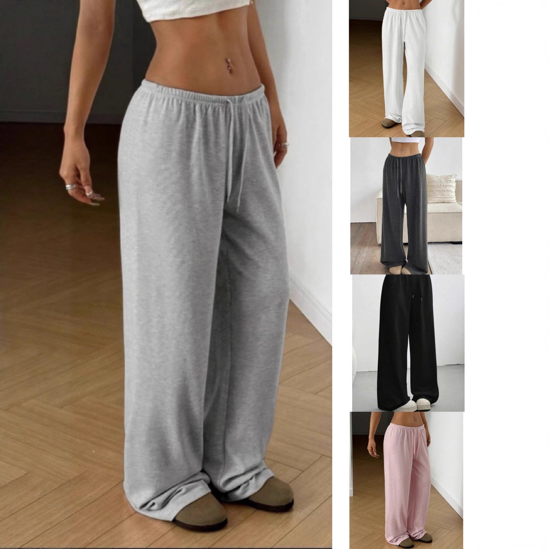 Gray wide-leg sweatpants with elastic waistband and drawstring, draped leg