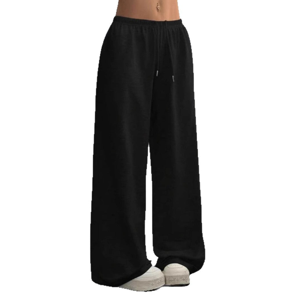 Black wide-leg sweatpants with elastic waistband and drawstring, relaxed fit