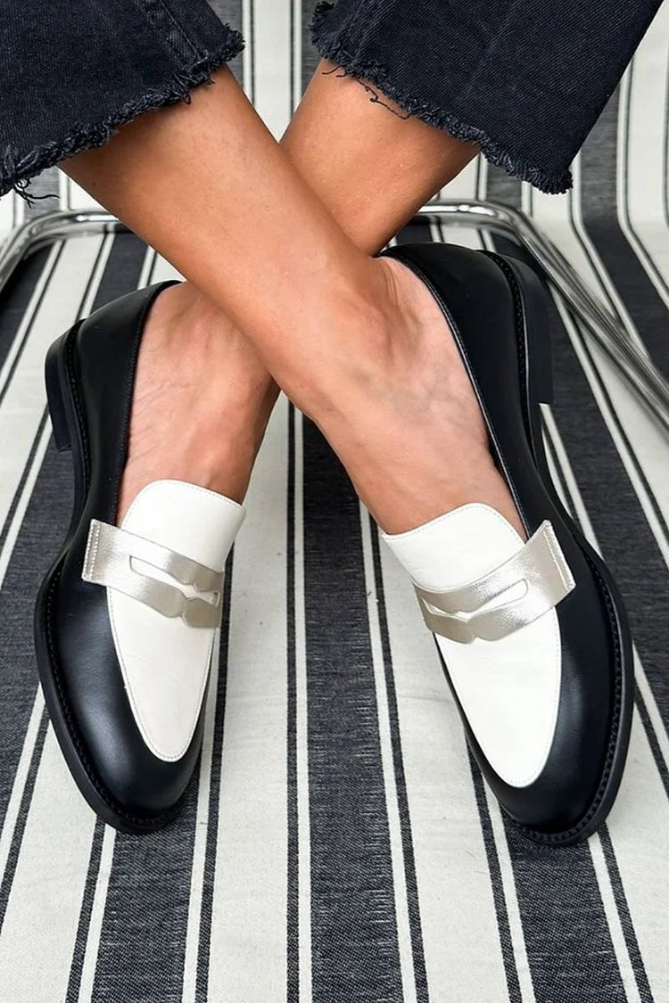 Two-tone leather loafers with metallic-look strap, white uppers and black soles