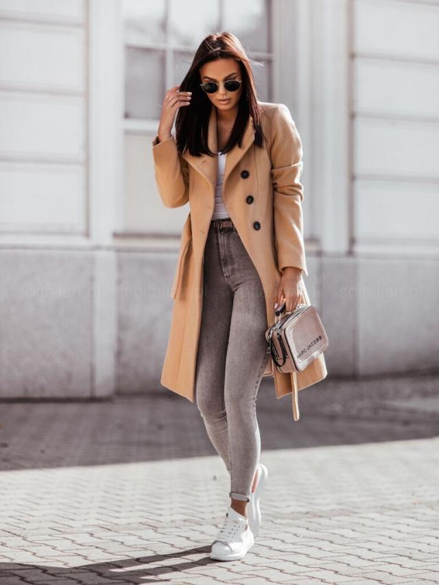 Beige women's belted trench coat, long sleeves, double-breasted buttons, notched lapels