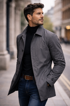 Men's weather-resistant overcoat in dark gray, notched lapel collar, button front, open hem.