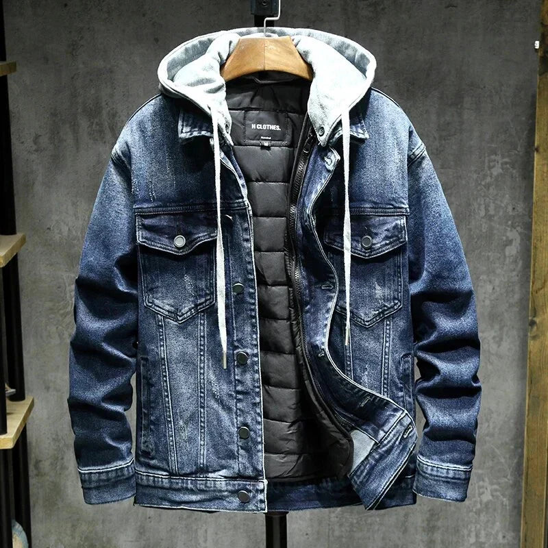Denim jacket in medium blue with hood, snap front, and buttoned chest pockets