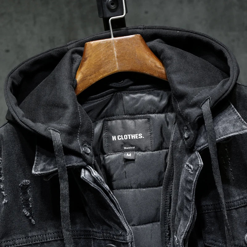 Denim jacket hood interior with brand label and drawstring cords