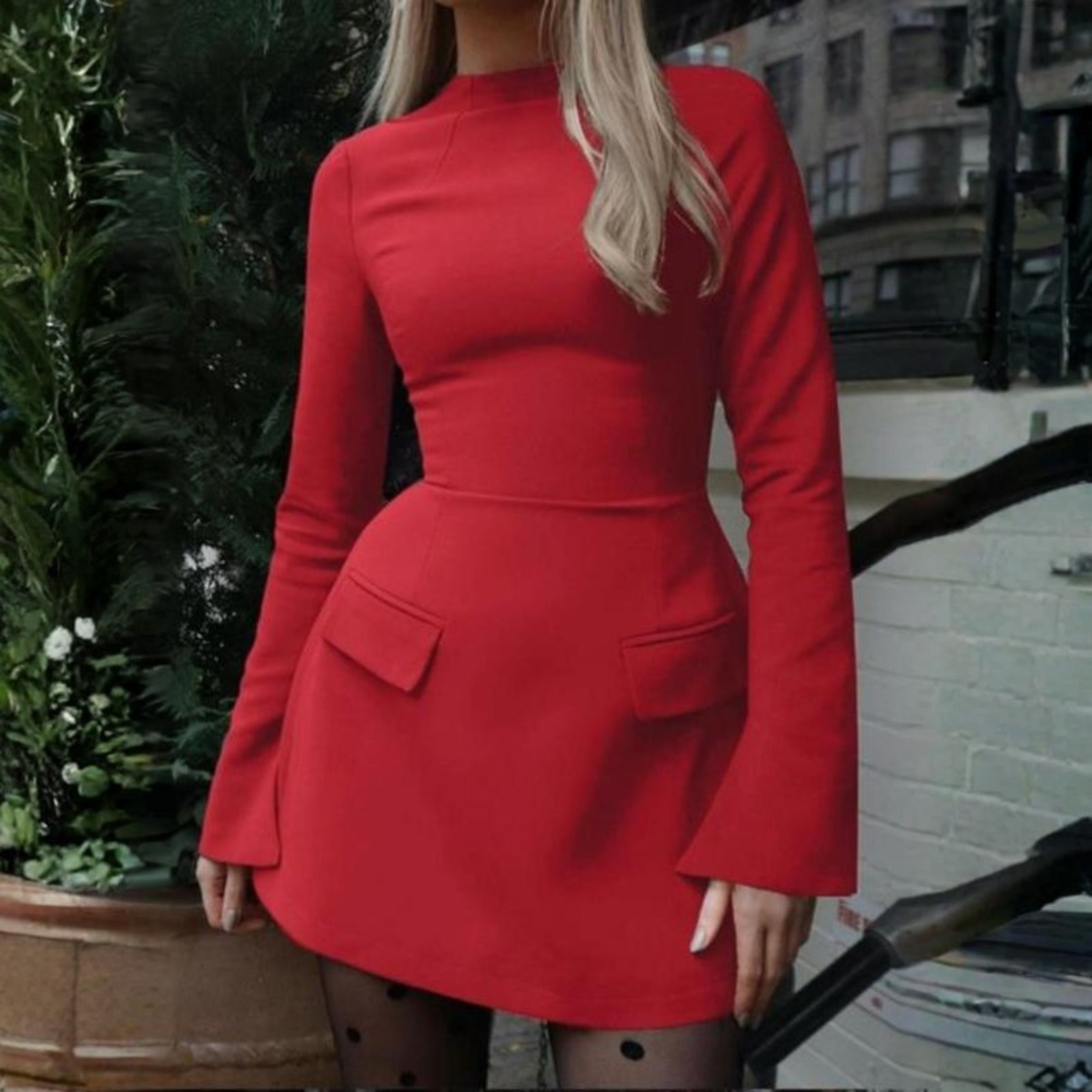Red long-sleeve bodycon mini dress with high neck and flap pocket details