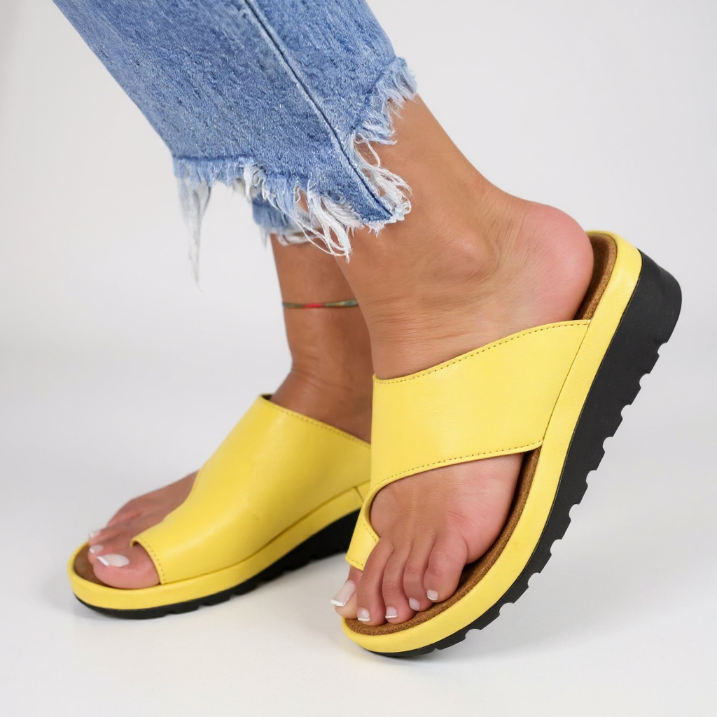 Women's yellow toe-split orthopedic sandals with wide strap and chunky outsole