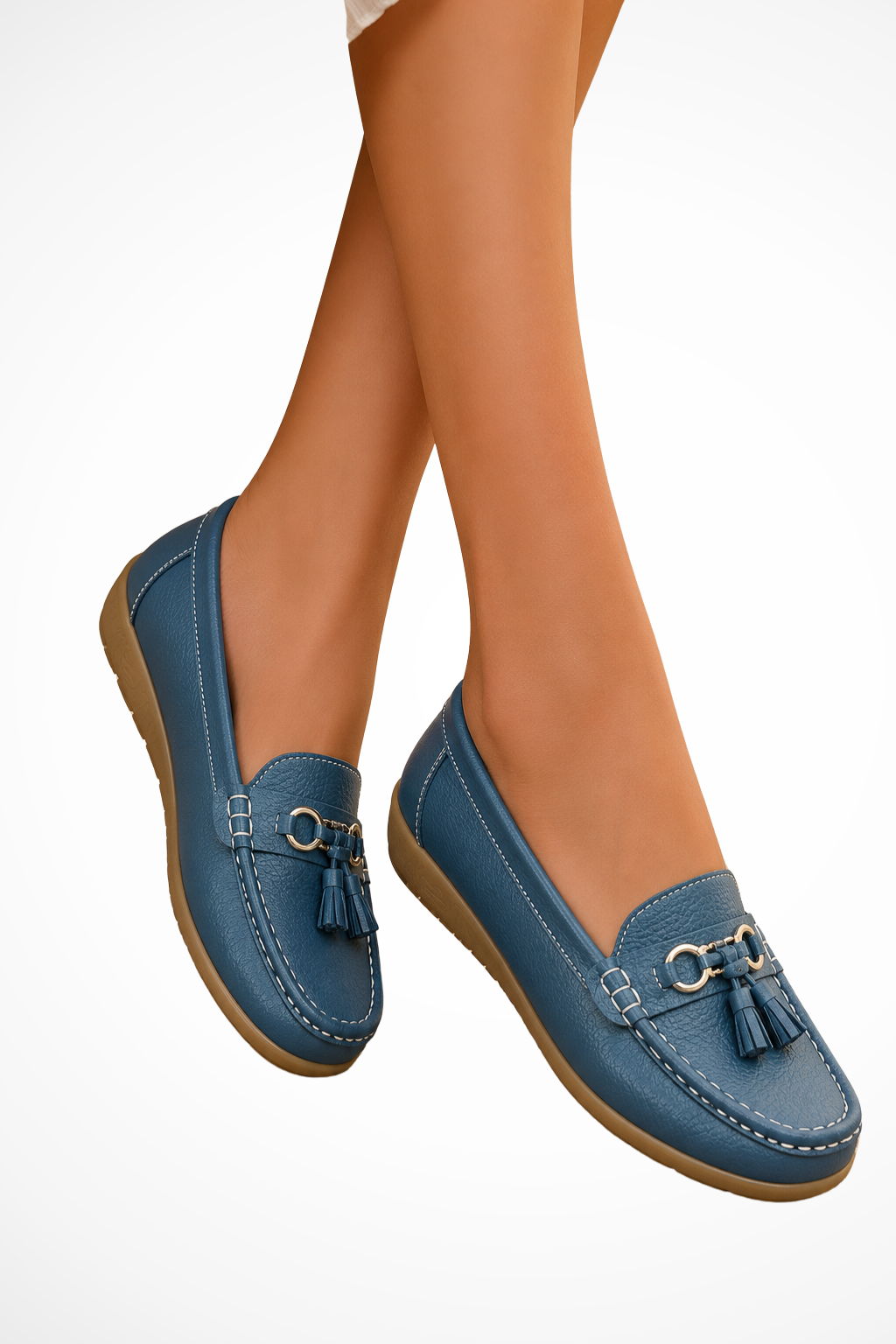 Women’s tassel leather loafer in denim blue, slip-on with metal ring and tassel