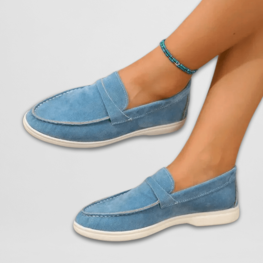 Blue women's suede slip-on loafers, round toe and low-profile white sole