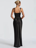 Backless black satin halter maxi dress with thin straps and gathered back