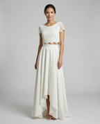 Women's lace wedding dress with short lace sleeves, white fitted waist and high-low skirt