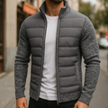 Dark gray zip-up fleece jacket with quilted puffer front and knit sleeves
