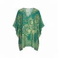 Oversized green tunic blouse with V-neck, short loose sleeves, and ornate yellow boho print