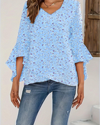 Light blue floral V-neck blouse with loose fit and 3/4 bell sleeves