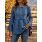 Blue pintucked peplum blouse with button-front and long flared sleeves